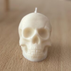 Espelma en forma de calavera, color blanc